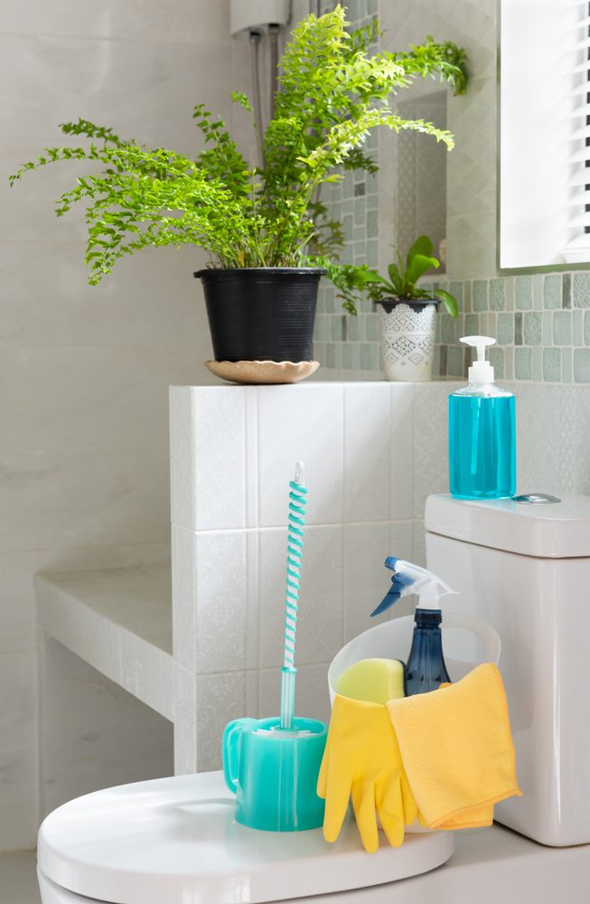 Basket,Of,Cleaning,Supplies,On,Toilet,Bowl,In,Modern,Bathroom
